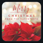 Red Poinsettias with Golden Bokeh Christmas Square Sticker<br><div class="desc">Personalised stickers with a festive holiday photograph featuring a bouquet of red poinsettias along the bottom. Shimmering golden bokeh lights in the background. Classy sophisticated  style. Merry Christmas typography written in a trendy red font.</div>