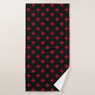 Red polka crosses on black bath towel