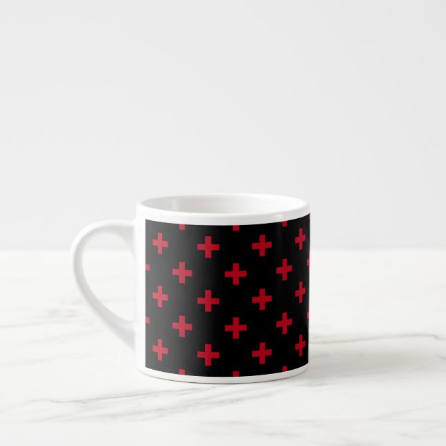 Red polka crosses on black espresso cup (Left)