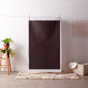 Red polka crosses on black fabric