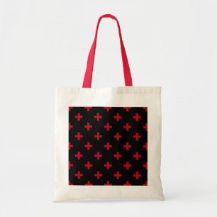 Red polka crosses on black tote bag
