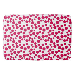 red polka dots on a white background bath mat