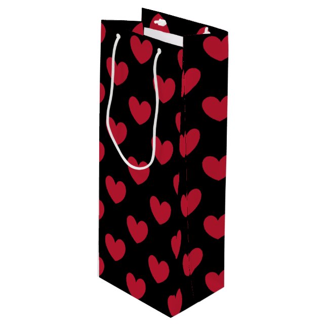 Red polka hearts on black wine gift bag (Front Angled)
