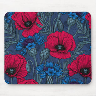 Red poppies and blue cornflowers on blue mouse pad
