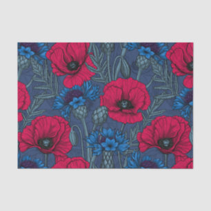 Red poppies and blue cornflowers on blue tissue paper
