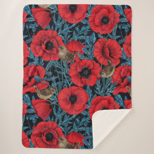 Red poppies and wrens, blue leaves on black sherpa blanket