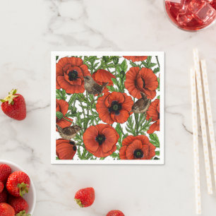 Red poppies and wrens, green leaves on white napkin