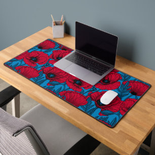 Red poppy garden on blue desk mat