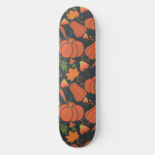 Red pumpkin seamless pattern and carrots skateboard