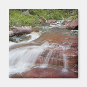 Red rock in Baring Creek in Glacier National Magnet