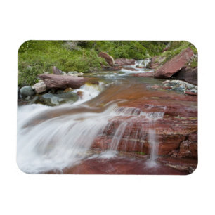 Red rock in Baring Creek in Glacier National Magnet