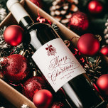 Red Romantic Calligraphy Merry Christmas<br><div class="desc">This Christmas wine label features elegant and romantic swirly calligraphy lettering,  accented with a winter berry holly bouquet . For more advanced customisation of this design,  please click the BLUE DESIGN TOOL BUTTON. Matching items are also available.</div>