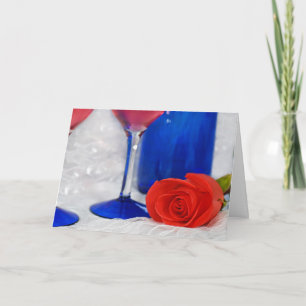 red rose on lace with card