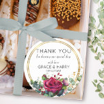 Red Roses in Gold Rings Wedding Favour Thank You Classic Round Sticker<br><div class="desc">Red rose wedding favour thank you stickers. Watercolor floral design with gorgeous red rose, eucalyptus leaves and greenery, framed with gold geometric rings. The template is ready for you to add your custom text, such as a thank you message, bride and groom names and wedding date. If you would like...</div>