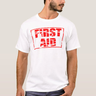 Red rubber stamp effect. First Aid.  T-Shirt