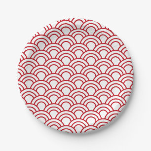 red scallop pattern on a white background paper plate