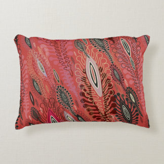 Red seamless decorative background with stylised v decorative cushion