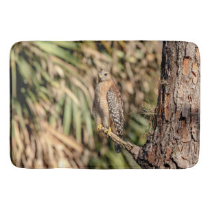 Red Shouldered Hawk in a tree Bath Mat
