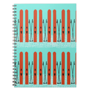 Red skis on blue notebook