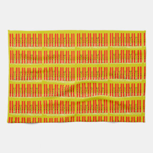 Red skis on yellow kitchen towel
