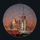 Red Sky for Space Shuttle Atlantis Launch Dartboard<br><div class="desc">The crisp morning air was electric with anticipation as the first rays of dawn painted the sky a fiery red. The colossal white silhouette of the Space Shuttle Atlantis dominated the launchpad, dwarfed only by the immensity of the moment. A collective gasp rippled through the crowd as plumes of fire...</div>