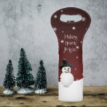 Red Snowman Winter Scene Christmas Wine Tote<br><div class="desc">Tote your wine to your holiday parties and get together's with this whimsical Red Snowman Winter Scene Christmas Wine Tote. Wine tote design features a happy snowman in a snowy wintry scene against a red background adorned with matching colour snowflakes and the saying "Making Spirits Bright" which you can leave...</div>