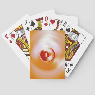 Red spinning music speaker playing cards
