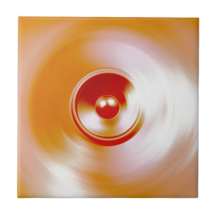 Red spinning music speaker tile