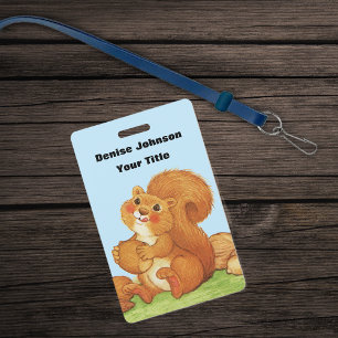 Red Squirrel Eating Nuts Sitting in Grass Blue Sky ID Badge