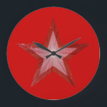 Red Star clock round red<br><div class="desc">Modern design with a "shining" red and white star on a red background. Wall clock with a customisable design for you to personalise with your own text, images and ideas. Please note that this is a printed image created using original photographs and digital techniques, it does not shine or contain...</div>