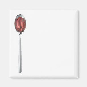 Red syrup in silver spoon magnet