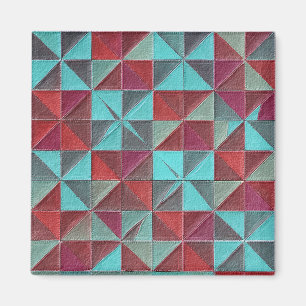 red, teal, purple, and gray quilt magnet