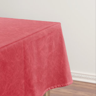 Red textured surface with subtle swirling pattern tablecloth