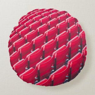 Red theatre chairs round cushion