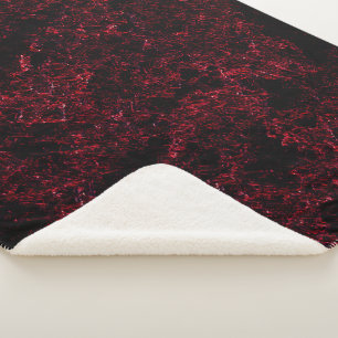 Red thick sponge upon dark red background sherpa blanket