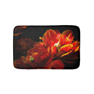 Red tulips dark background bath mat