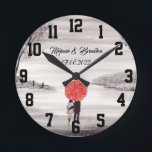 Red umbrella Love couple rustic romantic Wedding R Round Clock<br><div class="desc">Red umbrella watercolour painting. Love couple with red umbrella. Beautifully hand painted artwork by myself. Perfect for newlyweds,  couple.  Wedding anniversary gift. Valentine’s Day present. You can customise it with your names and date.</div>
