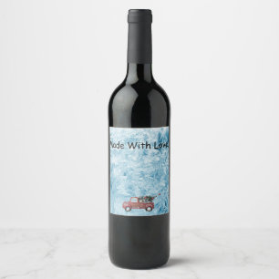 red vintage truck on a blue snowflake background   wine label