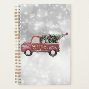 red vintage truck on a grey bokeh background planner