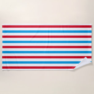 Red, white, and blue striped beach towel