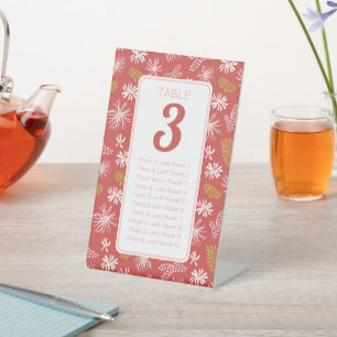 Red & white floral seating chart table # pedestal sign