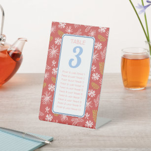 Red & white floral seating chart table # pedestal sign