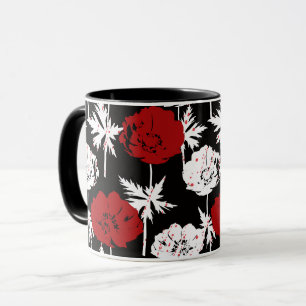 Red, white flowers on black mug