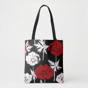 Red, white flowers on black . tote bag