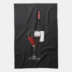red wine glass and bottle tea towel