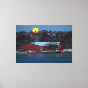 Red wooden boathouse in Helsinki, Finland  Canvas Print
