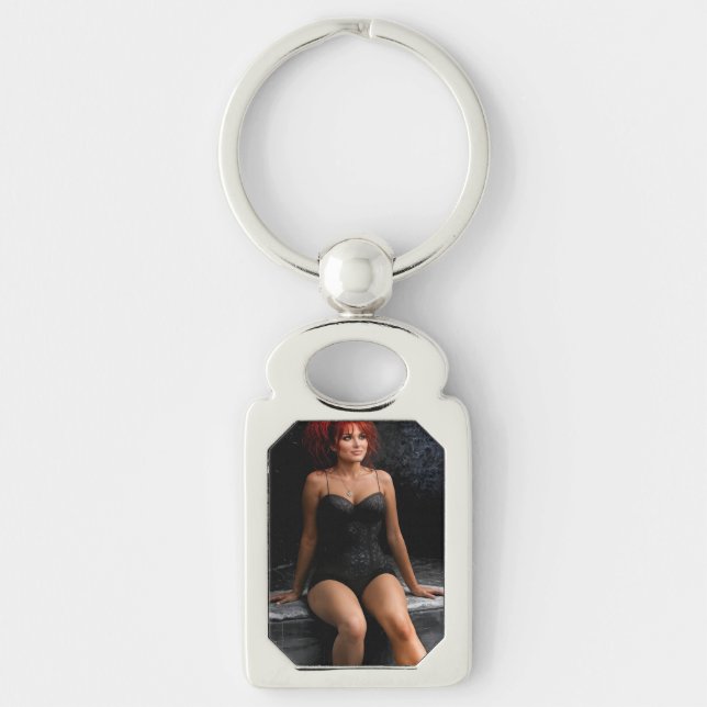 Redhead in the Dark metal keychain (Front)
