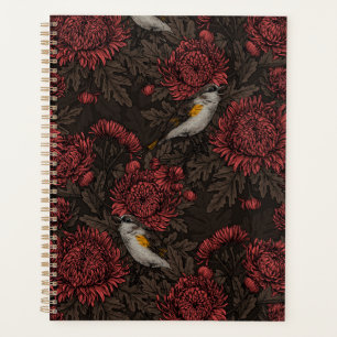Redstarts in the chrysanthemums in brown and red planner