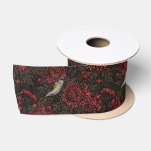 Redstarts in the chrysanthemums in brown and red satin ribbon