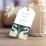Regal Swan Pair Wedding Gift Tag<br><div class="desc">Add a touch of elegance to your wedding favours with our Regal Swan Pair Wedding Gift Tag. This charming gift tag features a sophisticated design with two swans, their necks creating a harmonious heart shape, on a deep navy blue backdrop adorned with gold and white accents. The textured paper enhances...</div>